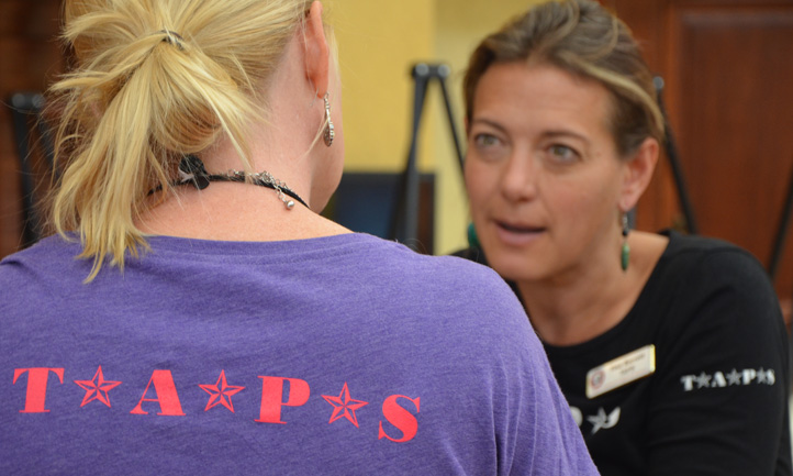 TAPS Staff Helping Survivor